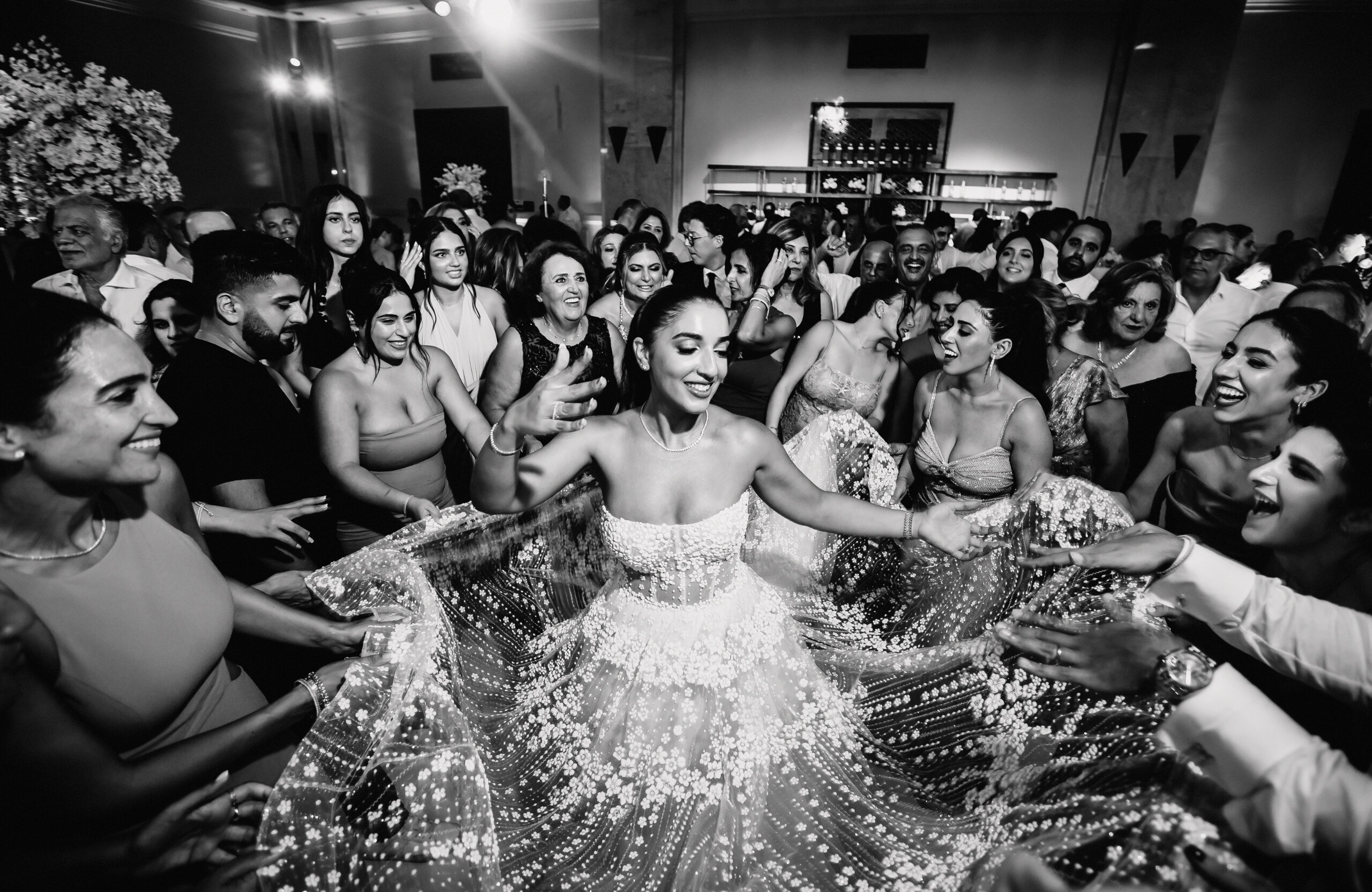 black and white photo of bride on the dance floor at Grand Velas Riviera Nayarit