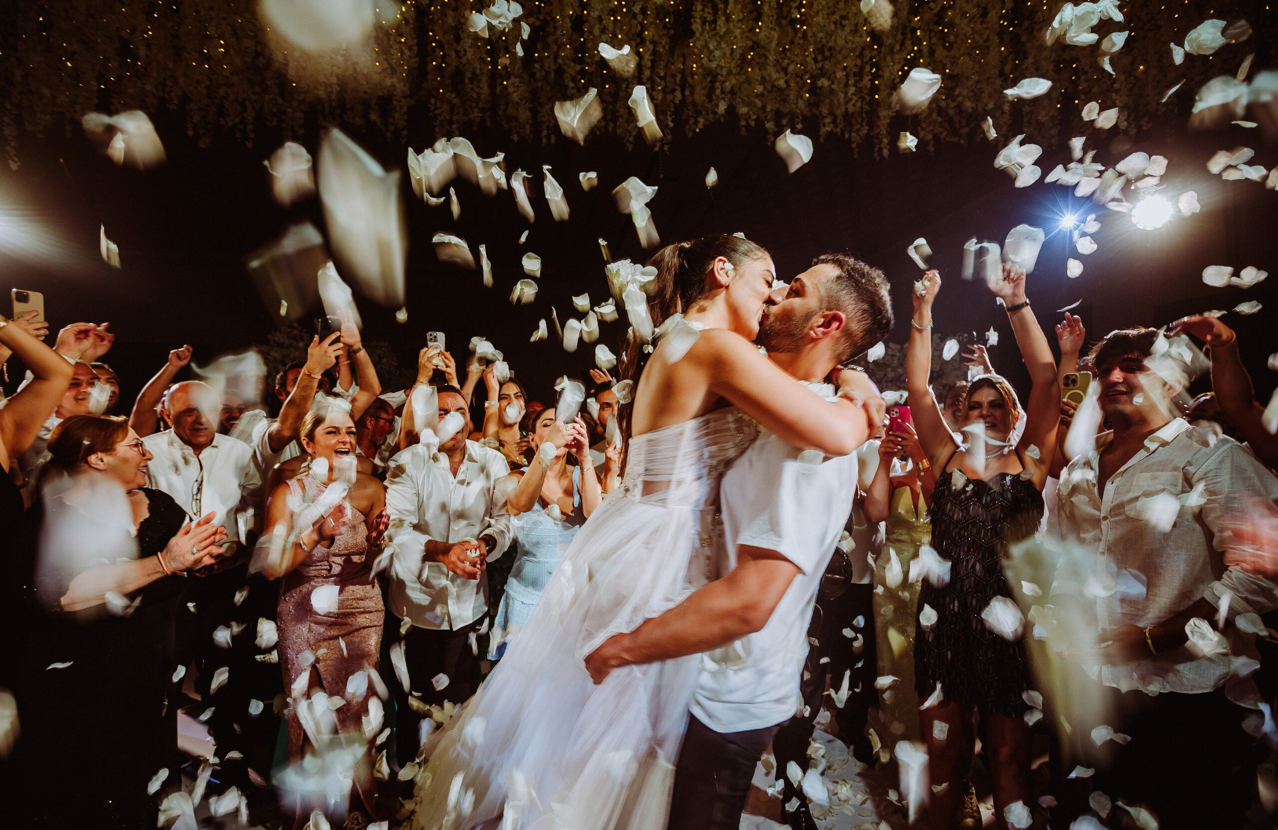 bride and groom on dance floor with confetti at Grand Velas Riviera Nayarit