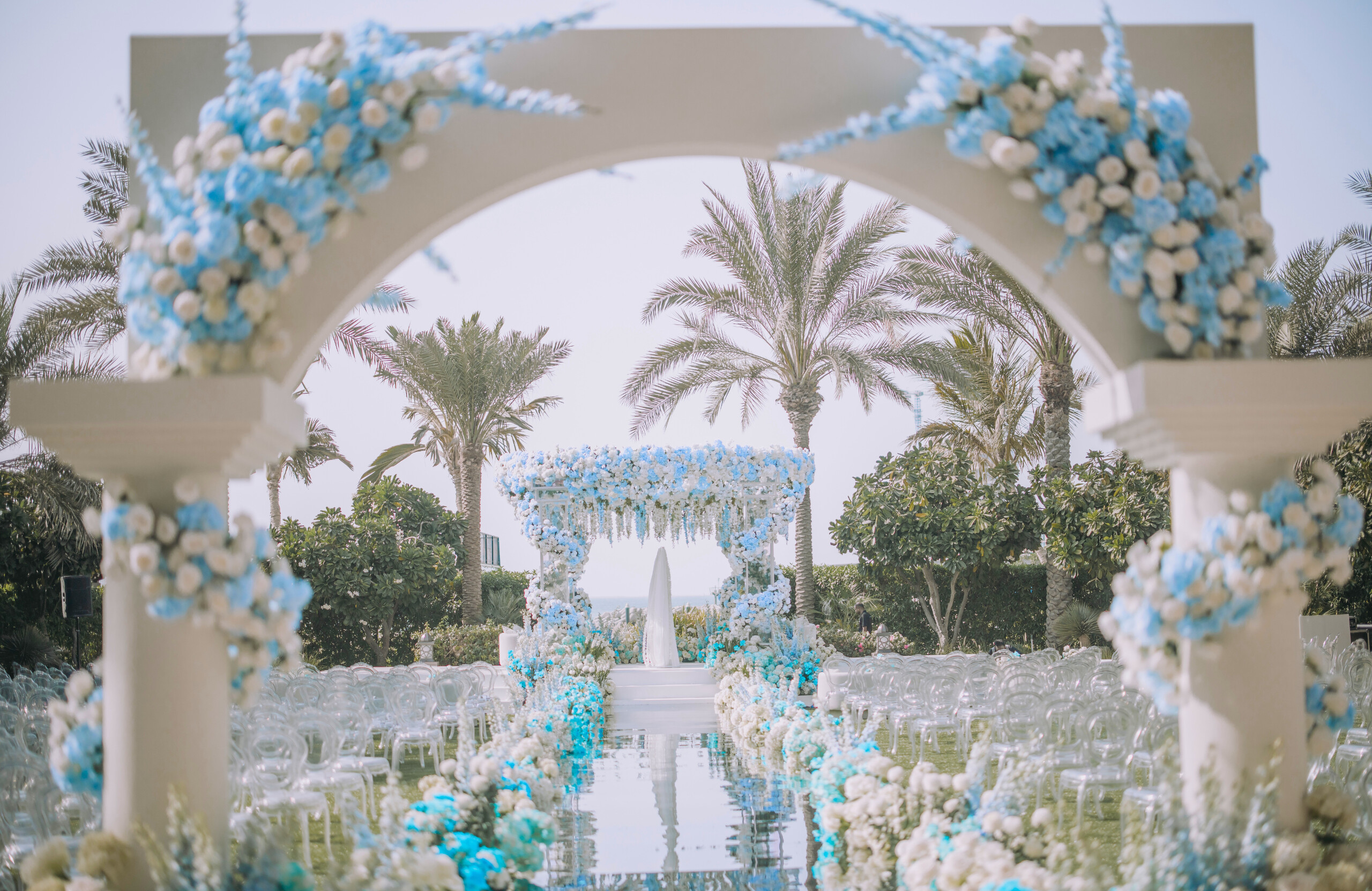 ethereal Nikkah wedding ceremony decor with mirrored aisle in Dubai