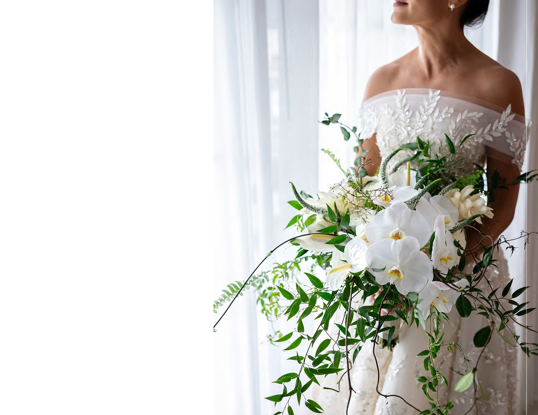 Bride holding a white orchid bouquet