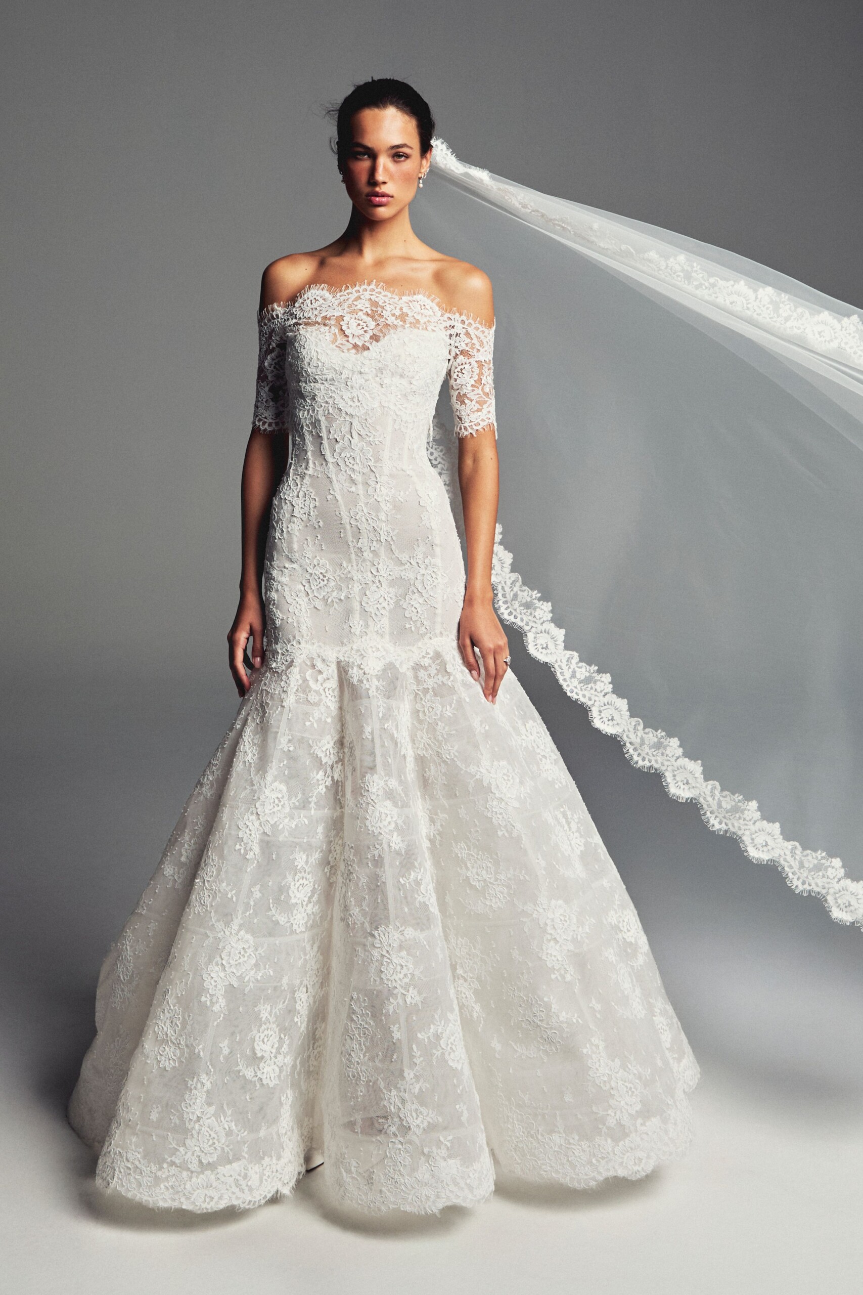 Monique Lhuillier Spring 2027 Bridal Collection 5 Lace Drop Waist Wedding Gown with Veil