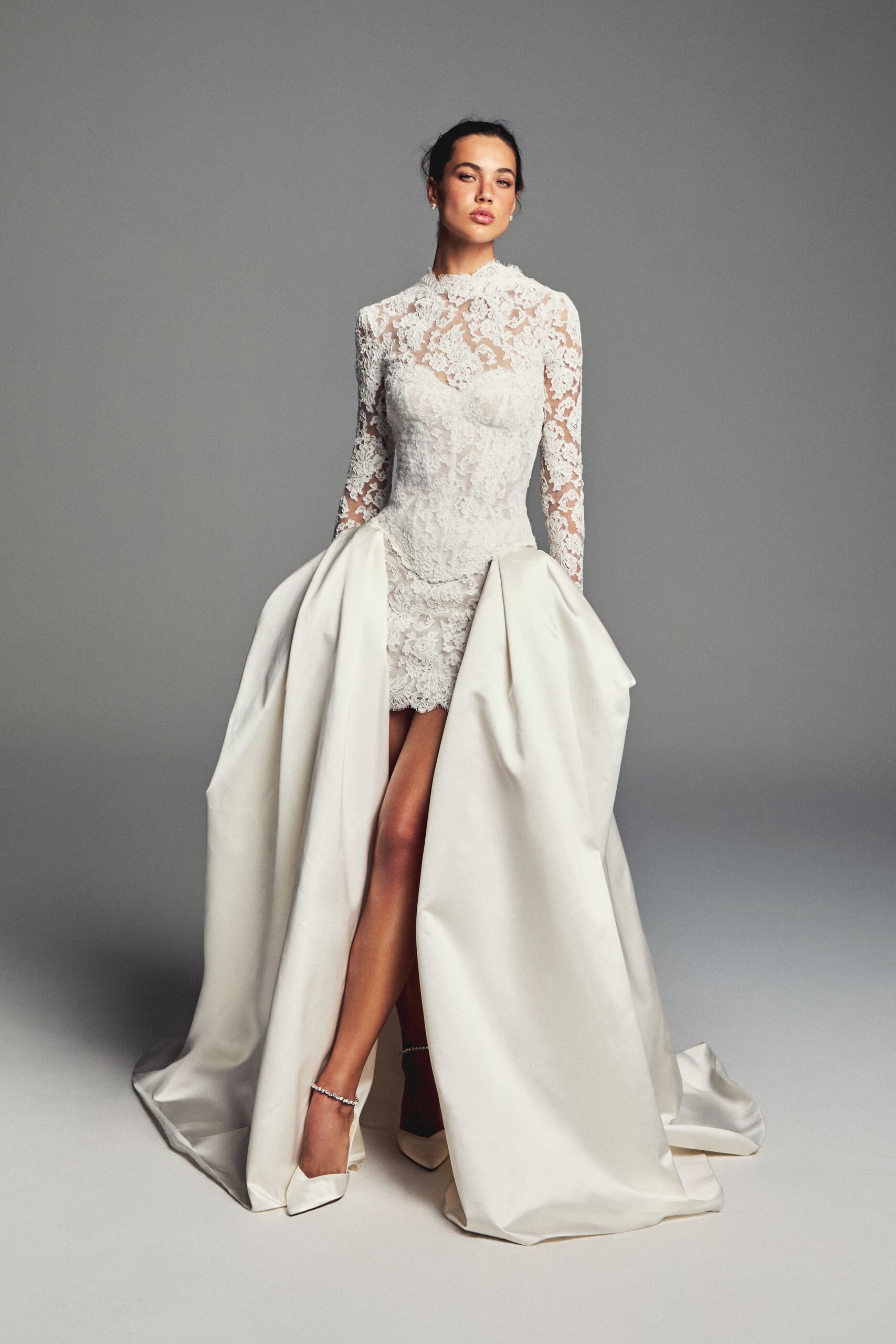 Monique Lhuillier Spring 2027 Bridal Collection Lace Wedding Gown with Overskirt