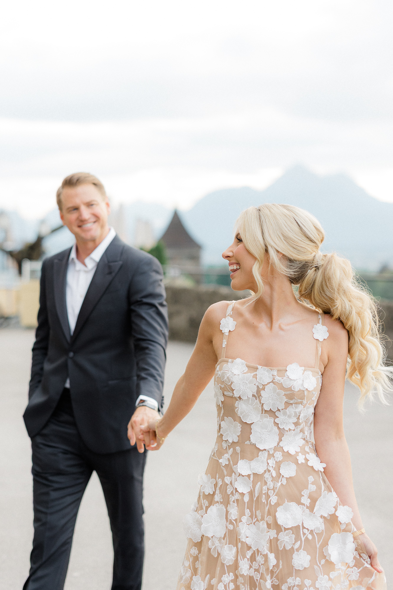 couple holding hands in Salzburg
