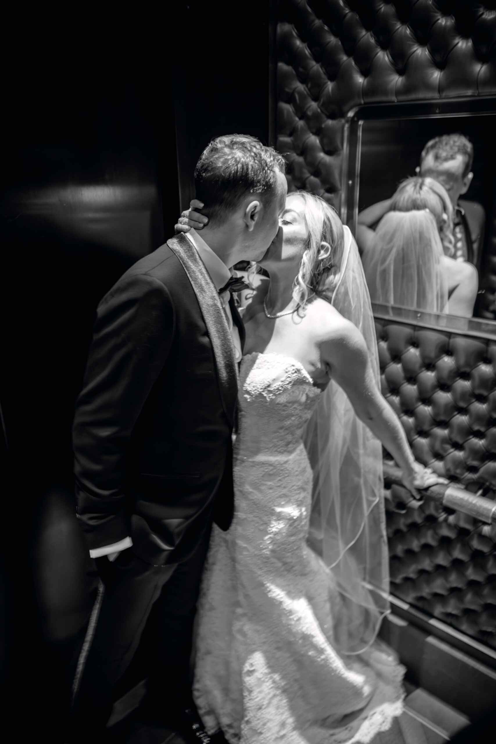 0G4A2005 black and white photo of bride and groom kissing